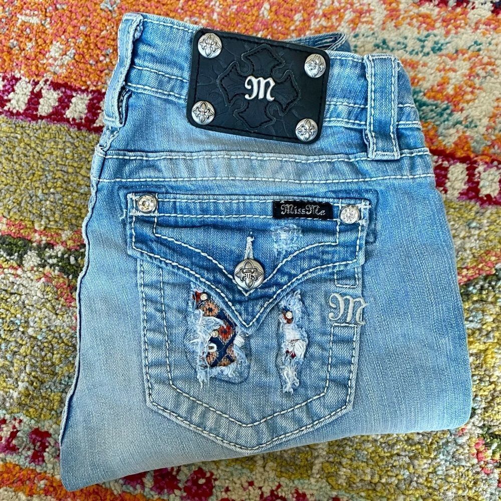 Miss Me Signature Rhinestone Embroidered Blow Out Flap Pocket Skinny Jeans